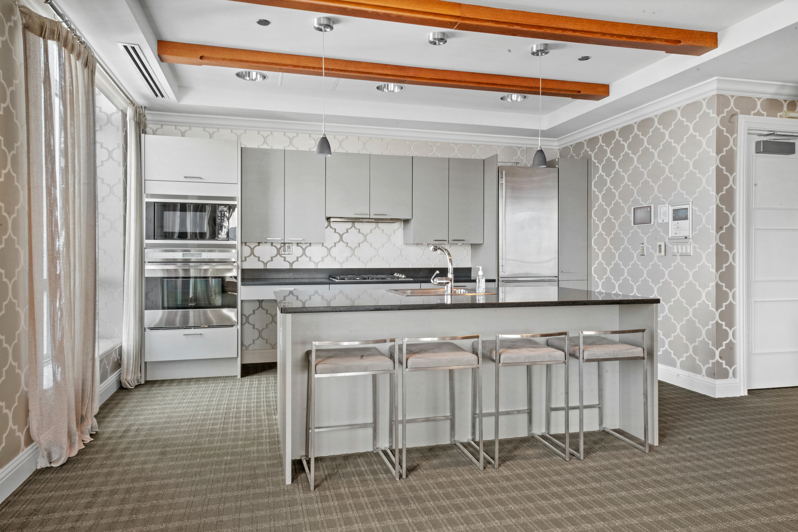 10 East Delaware Place, Unit 34A Chicago, IL 60611 - Photo 47 of 51 a kitchen with stainless steel appliances granite countertop a white cabinets and a dishwasher