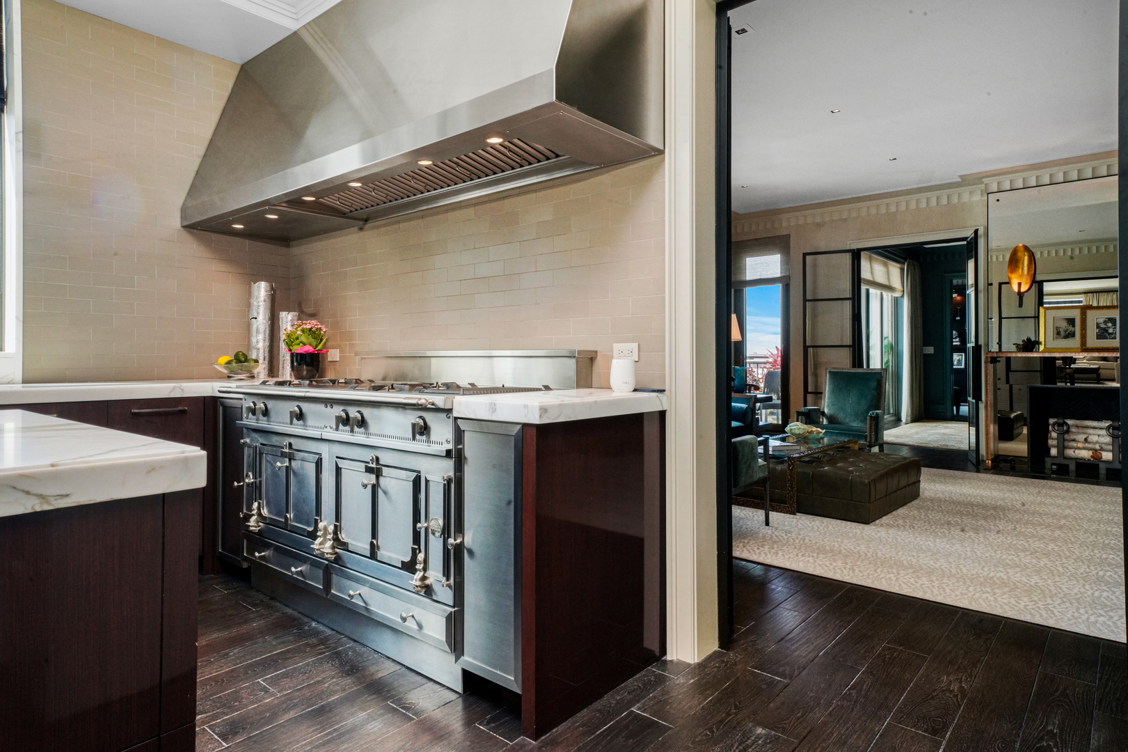 10 East Delaware Place, Unit 34A Chicago, IL 60611 - Photo 10 of 51 a kitchen with stainless steel appliances granite countertop a stove and a refrigerator