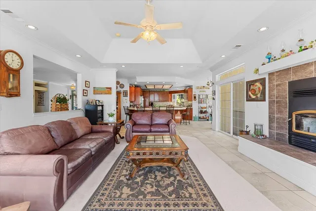 a bedroom with a large bed and a large window