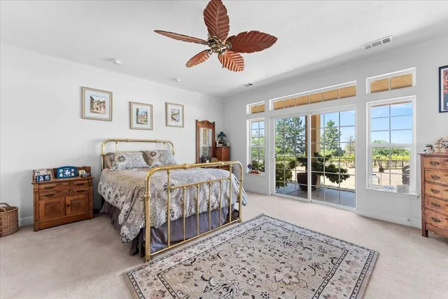 a bathroom with a tub sink double vanity and mirror