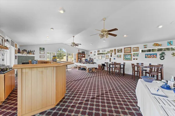 a view of a lake with a building in the background