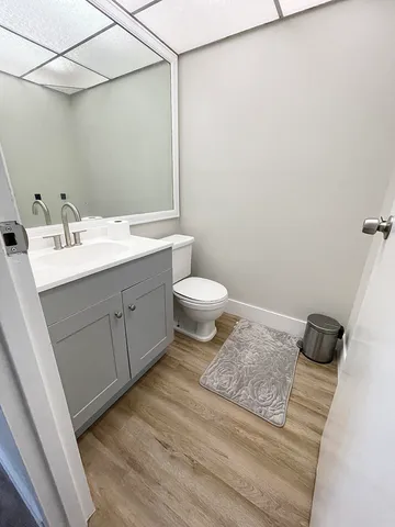 a bathroom with a sink and mirror
