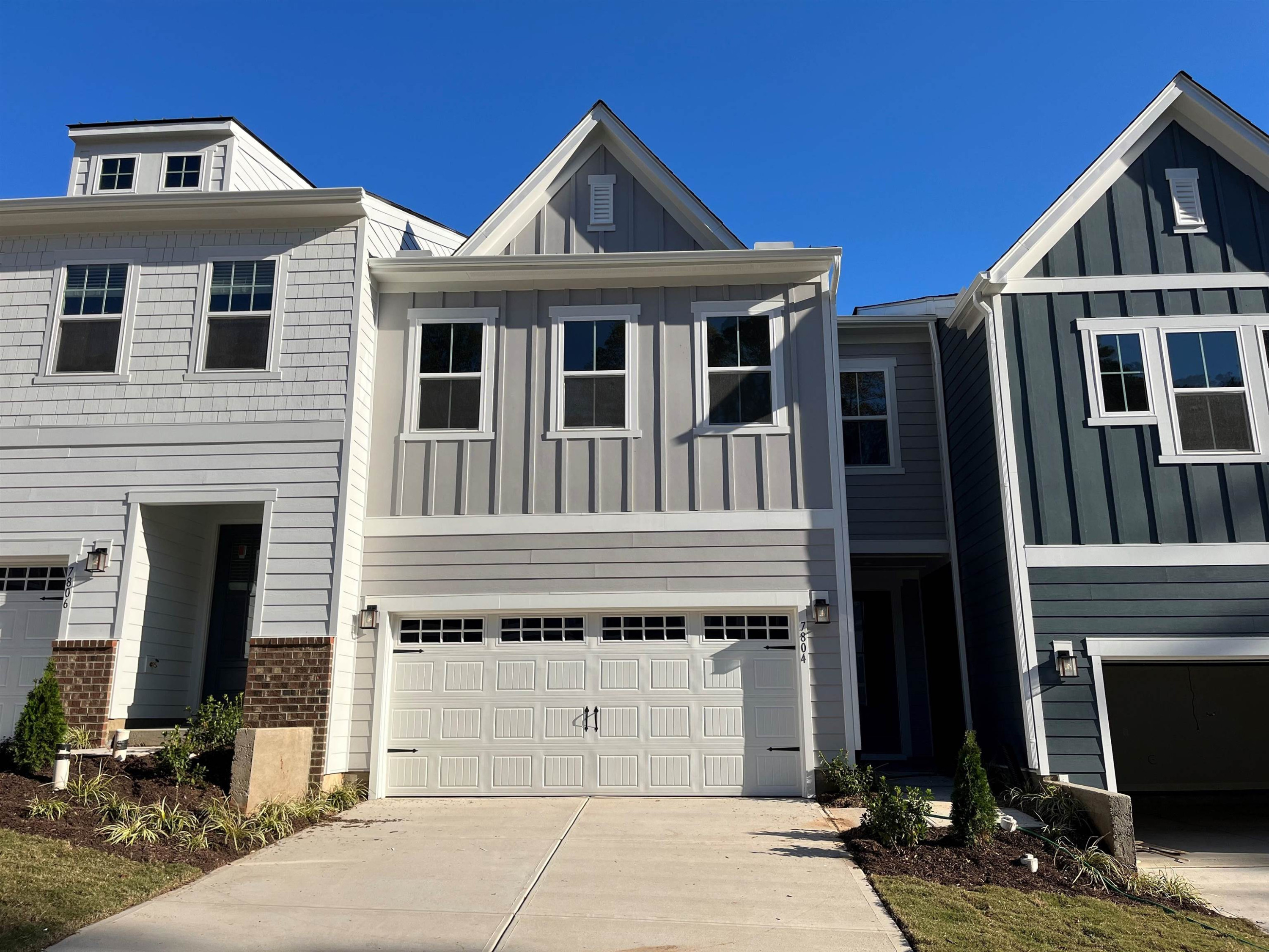7804 Sofiana Avenue Raleigh, NC 27617 - Photo 1 of 28 a front view of a house with a yard