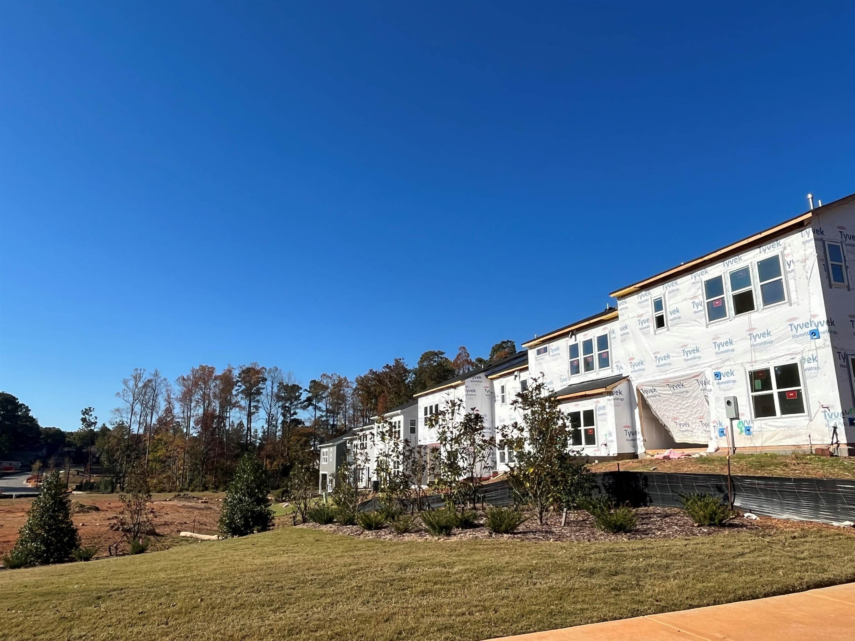 7804 Sofiana Avenue Raleigh, NC 27617 - Photo 22 of 28 a front view of a house with a yard