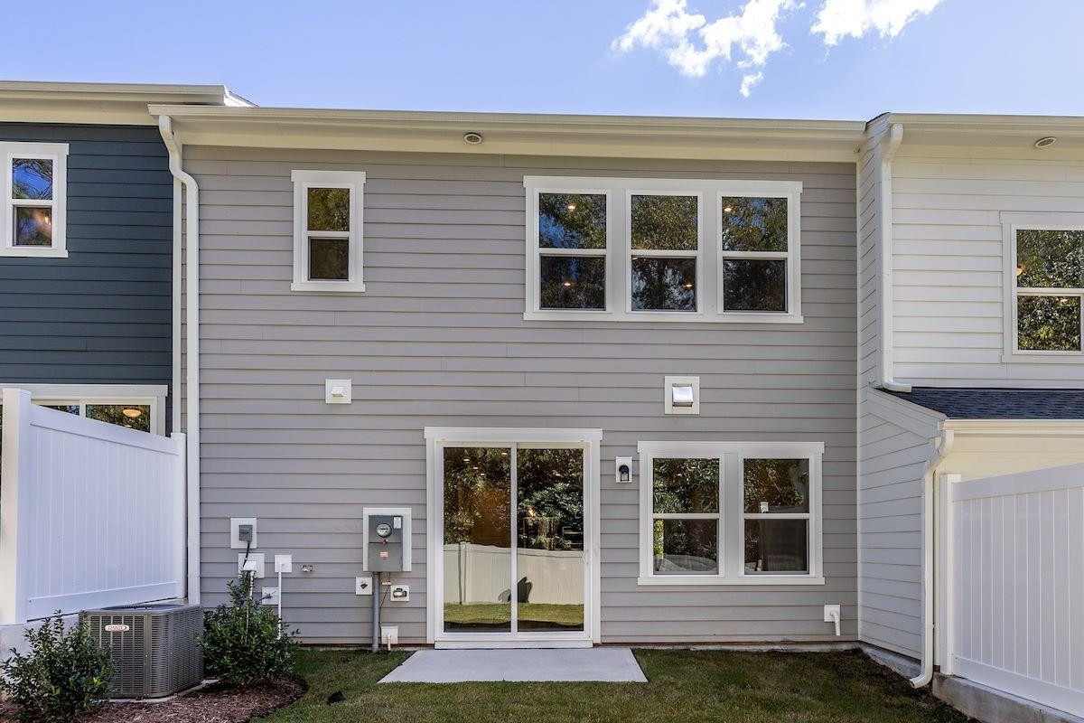7804 Sofiana Avenue Raleigh, NC 27617 - Photo 25 of 28 a view of a house with a window and a yard