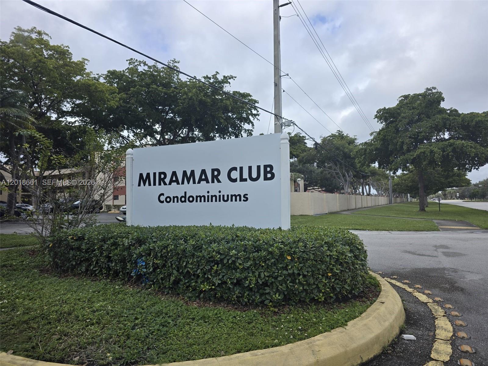 3396 Foxcroft Road, Unit 113 Miramar, FL 33025 - Photo 1 of 17 a sign on the side of the road