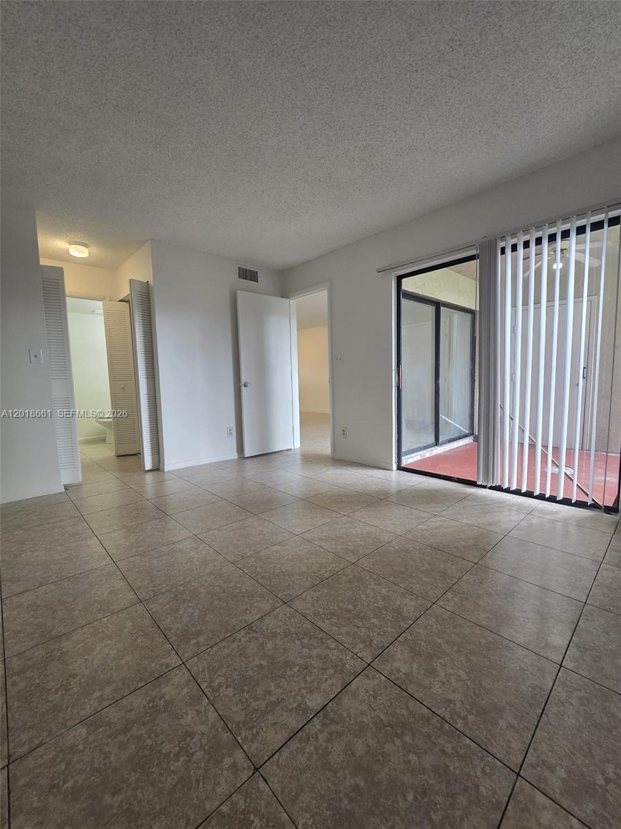 3396 Foxcroft Road, Unit 113 Miramar, FL 33025 - Photo 10 of 17 a view of empty room