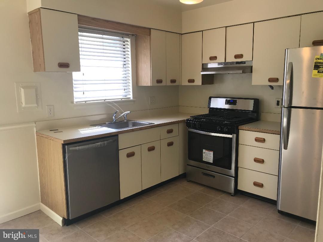 6 Eaves Mill Road Medford, NJ 08055 - Photo 18 of 37 a kitchen with stainless steel appliances a stove a sink and a refrigerator