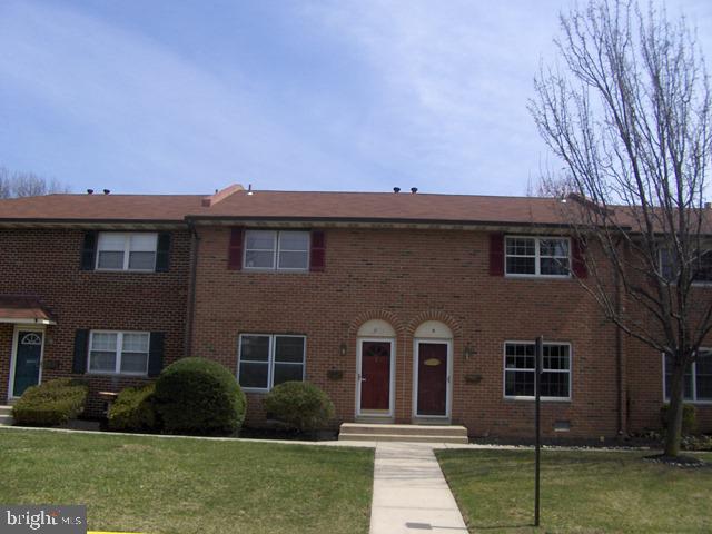 6 Eaves Mill Road Medford, NJ 08055 - Photo 2 of 37 a front view of a house with a garden