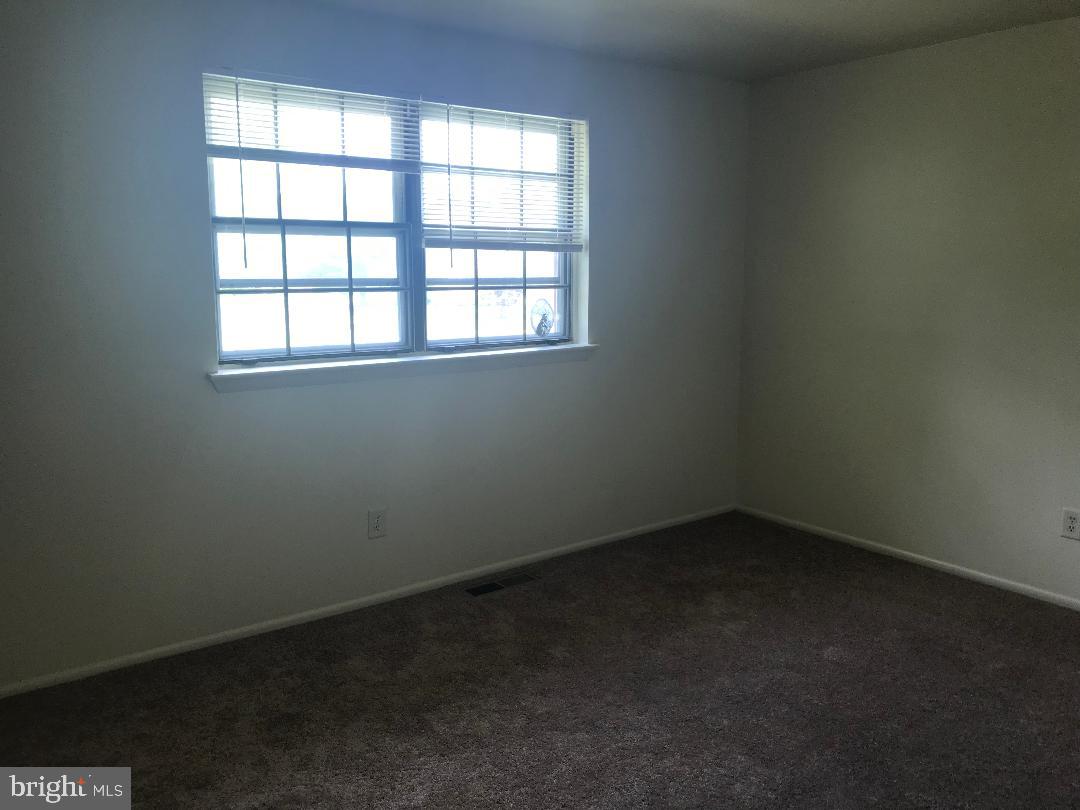 6 Eaves Mill Road Medford, NJ 08055 - Photo 28 of 37 an empty room with a window