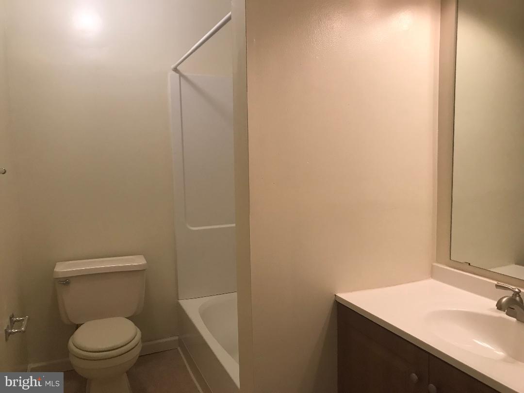 6 Eaves Mill Road Medford, NJ 08055 - Photo 31 of 37 a bathroom with a sink a toilet and vanity