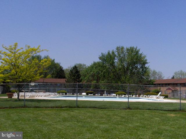 6 Eaves Mill Road Medford, NJ 08055 - Photo 5 of 37 a view of a swimming pool with a yard