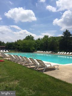 6 Eaves Mill Road Medford, NJ 08055 - Photo 7 of 37 a view of a golf course with a lake
