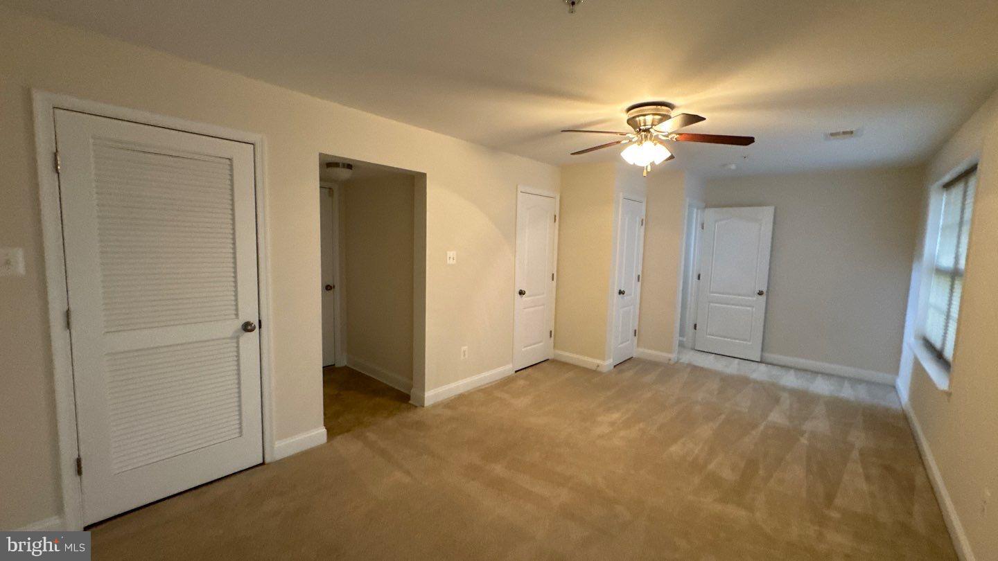 9727 June Flowers Way Laurel, MD 20723 - Photo 27 of 30 a view of empty room with fan