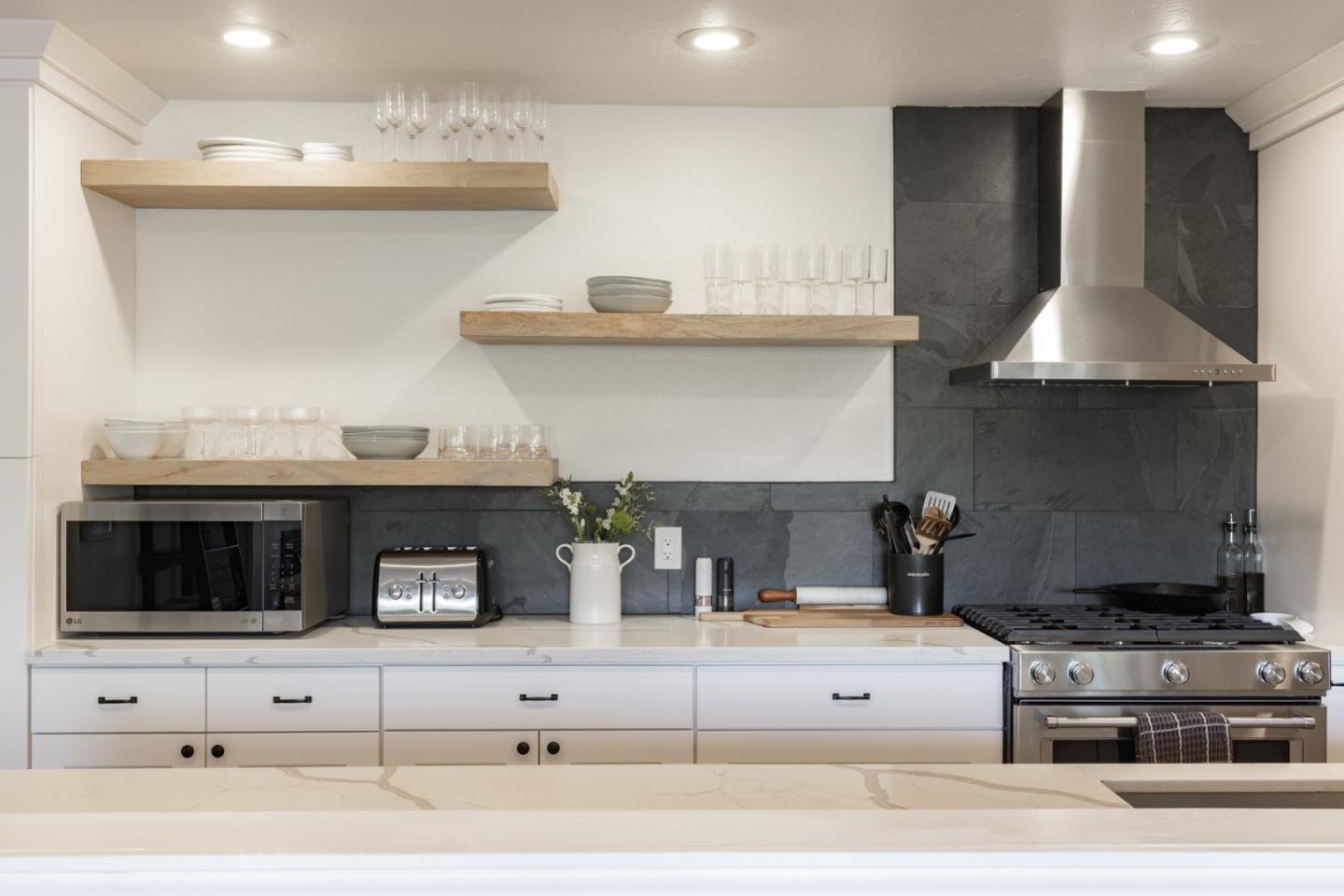 5914 Channel Drive Santa Rosa, CA 95409 - Photo 8 of 29 a kitchen with a stove and a white cabinets