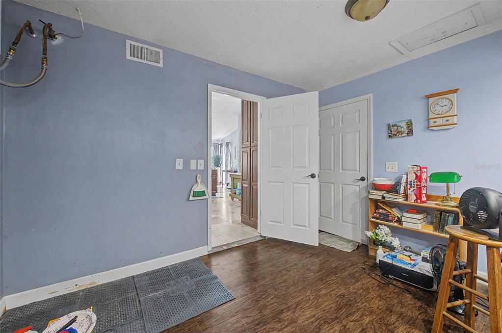 1632 Pintail Court Lutz, FL 33549 - Photo 23 of 34 a view of a room with wooden floor