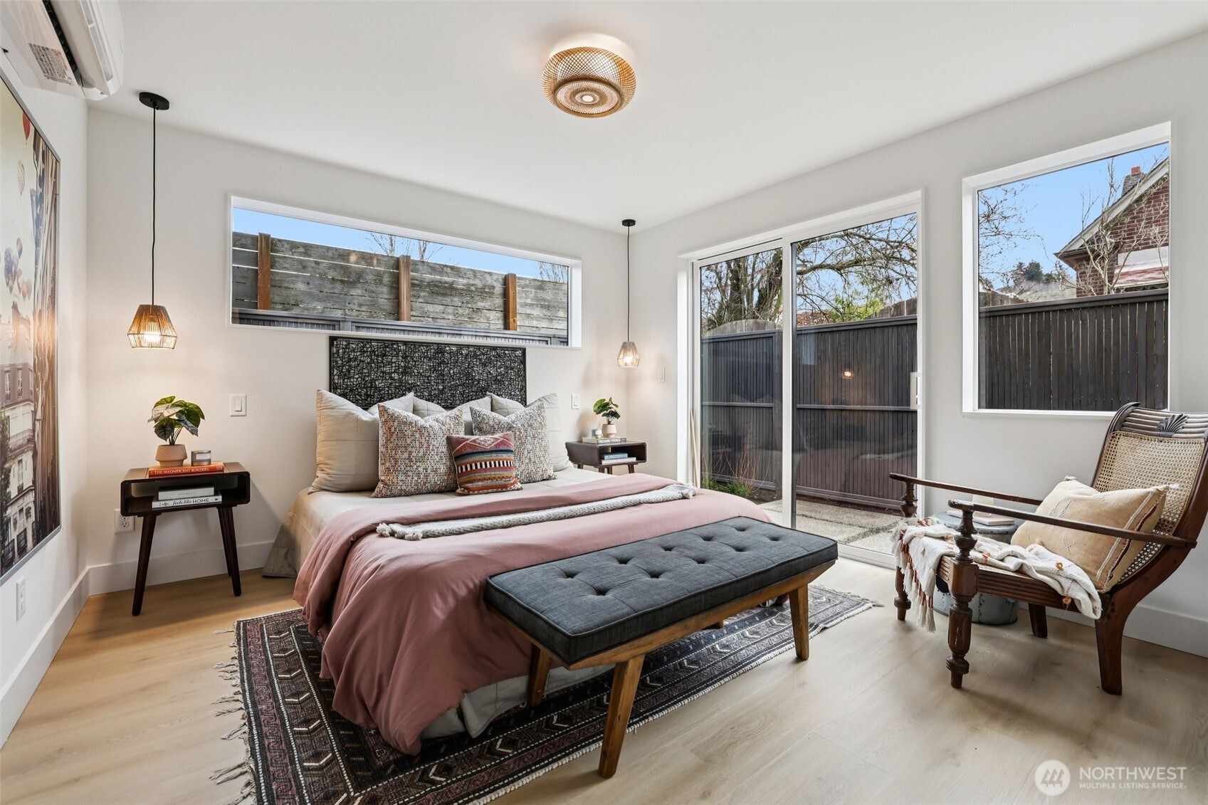 2626 A 58th Avenue Southwest Seattle, WA 98116 - Photo 19 of 40 a bedroom with a bed and a window