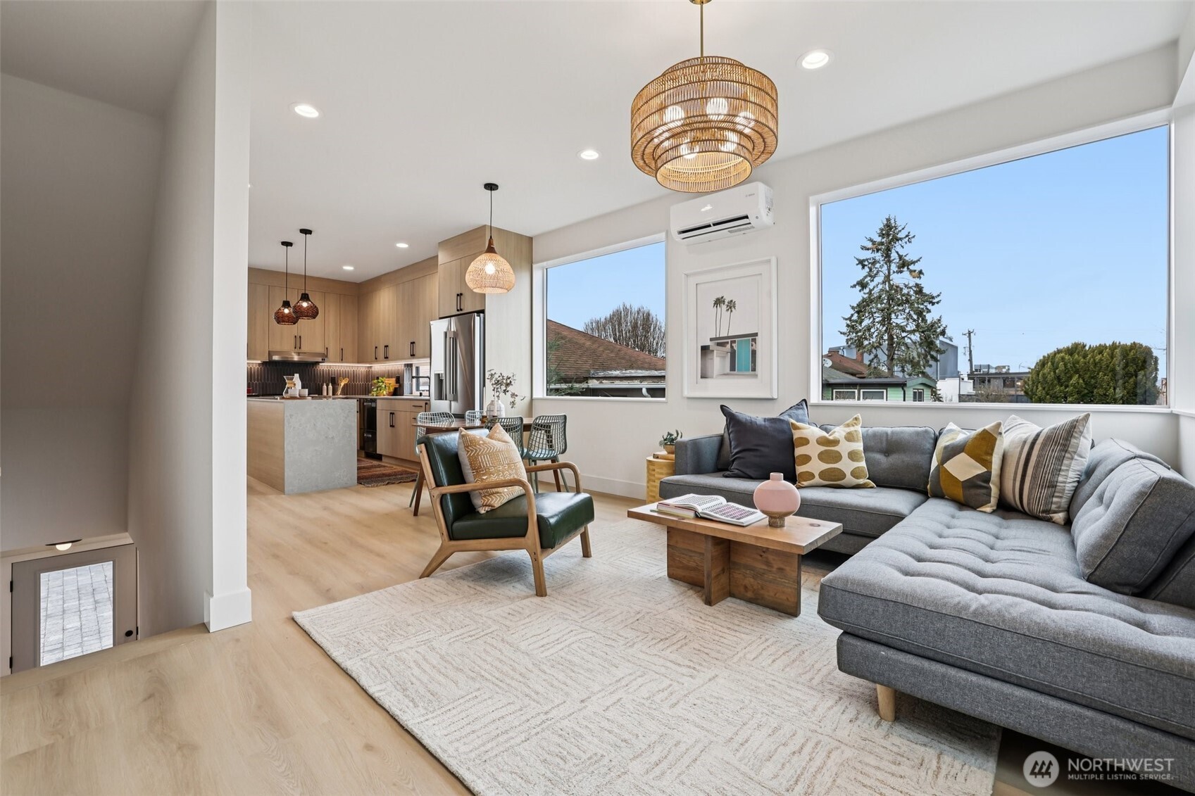 2626 A 58th Avenue Southwest Seattle, WA 98116 - Photo 3 of 40 a living room with furniture kitchen view and a large window