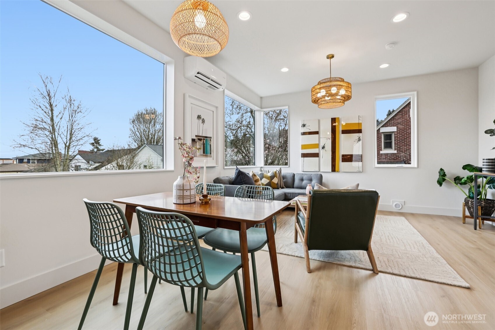 2626 A 58th Avenue Southwest Seattle, WA 98116 - Photo 6 of 40 a view of a dining room and a table and chairs