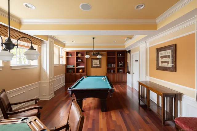 a bedroom with a bed and a fireplace