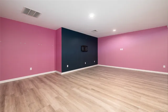 a bathroom with a bathtub and sink