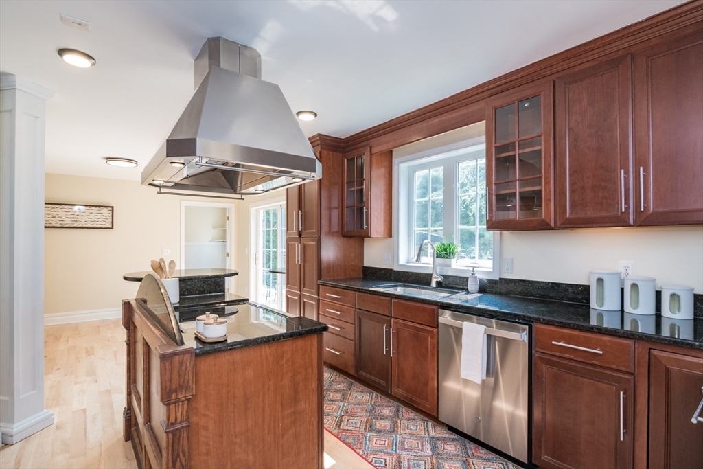 958 East Pleasant Street Amherst, MA 01002 - Photo 13 of 42 a kitchen with stainless steel appliances granite countertop a sink stove and refrigerator