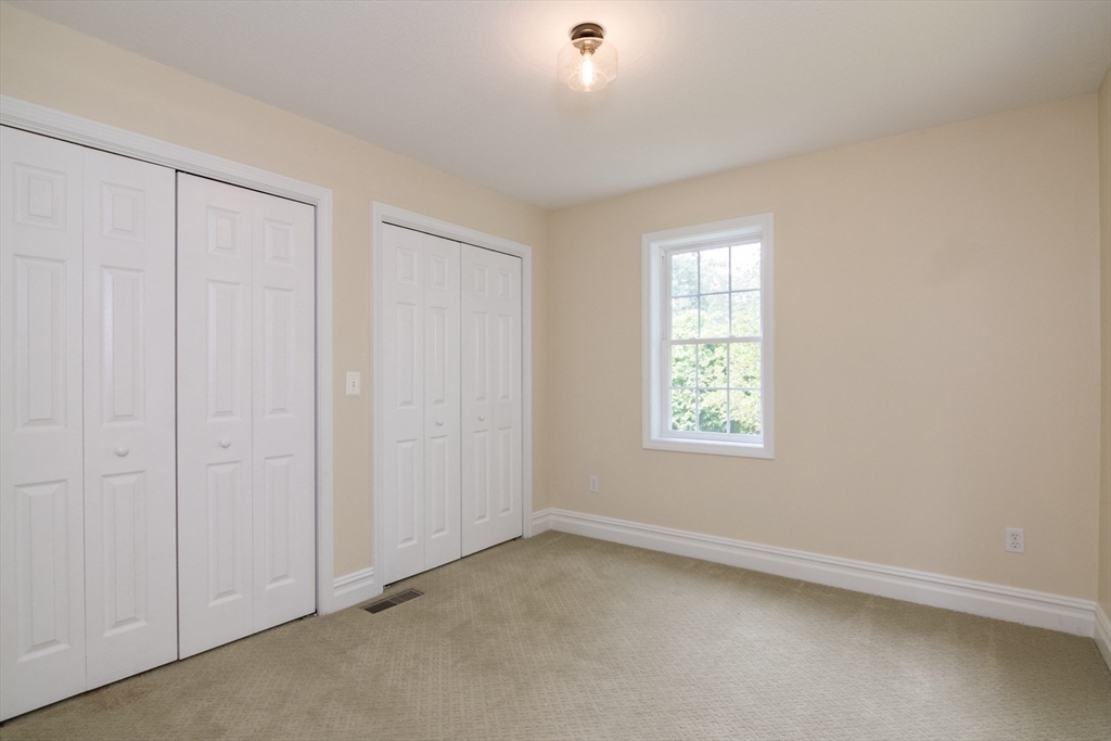 958 East Pleasant Street Amherst, MA 01002 - Photo 31 of 42 an empty room with a window
