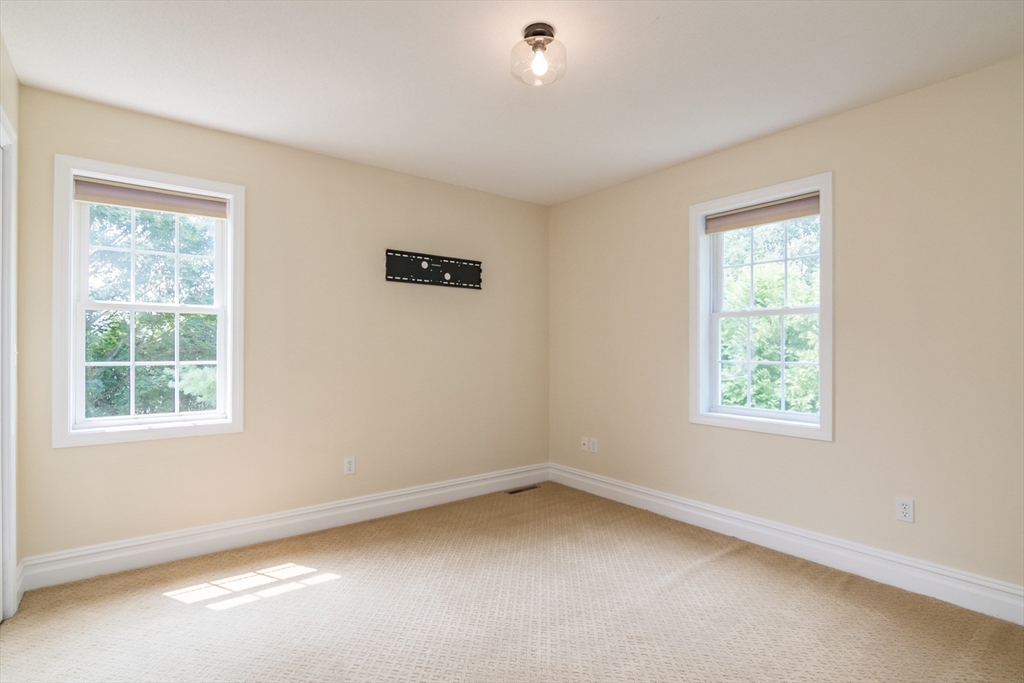 958 East Pleasant Street Amherst, MA 01002 - Photo 35 of 42 an empty room with a window