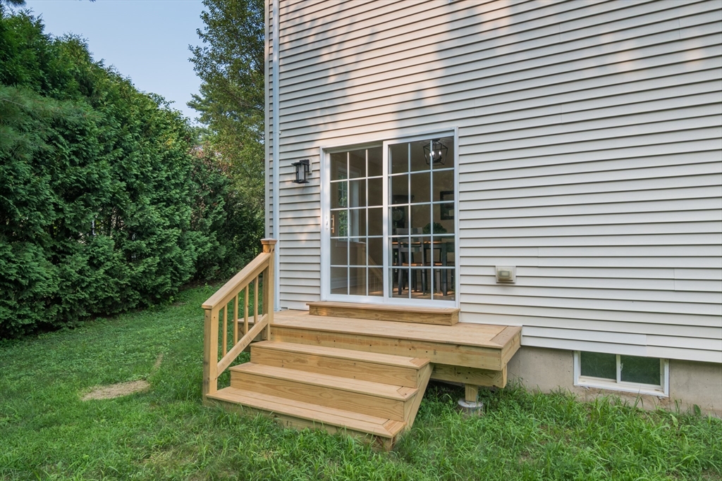 958 East Pleasant Street Amherst, MA 01002 - Photo 38 of 42 a front view of a house with a yard