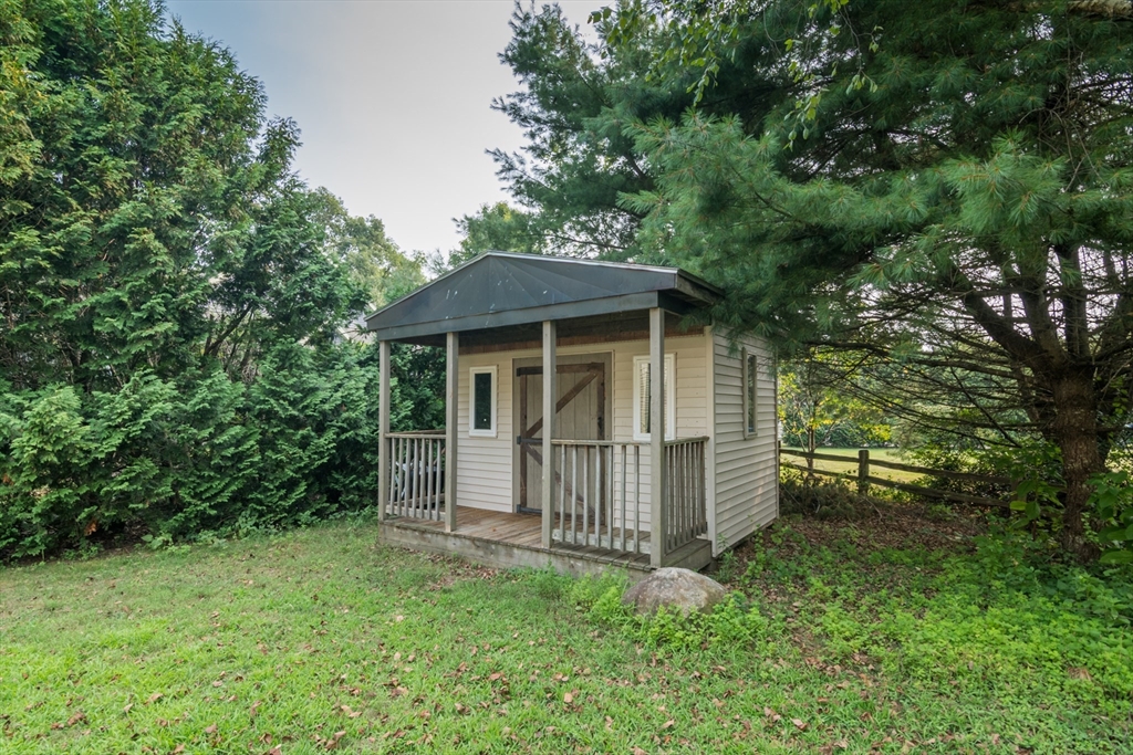 958 East Pleasant Street Amherst, MA 01002 - Photo 40 of 42 a house with trees in the background