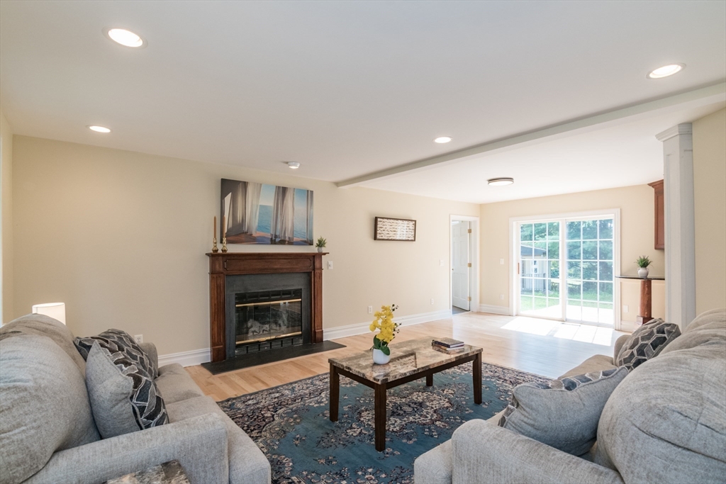 958 East Pleasant Street Amherst, MA 01002 - Photo 6 of 42 a living room with furniture and a fireplace