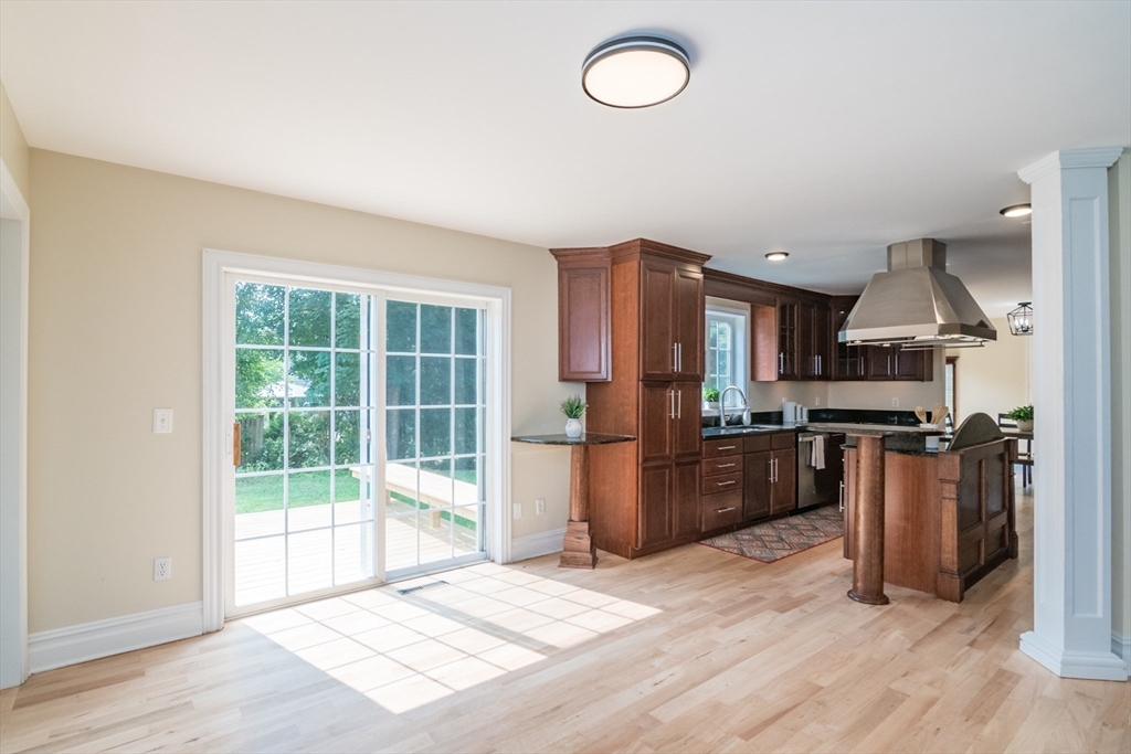 958 East Pleasant Street Amherst, MA 01002 - Photo 10 of 42 a kitchen with a refrigerator and a stove top oven