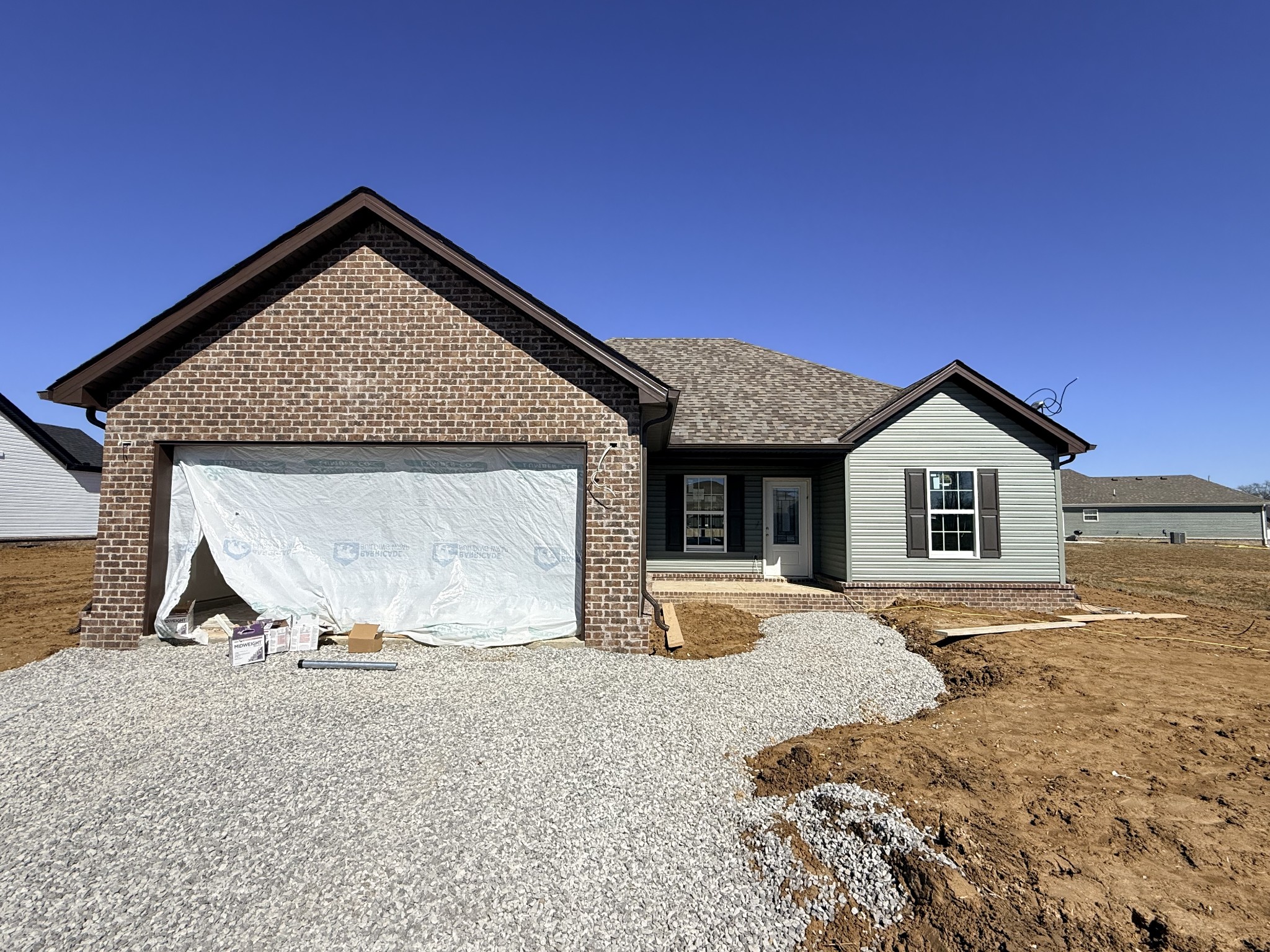 384 Ridge Street Manchester, TN 37355 - Photo 2 of 21 a view of a house with a yard and large tree