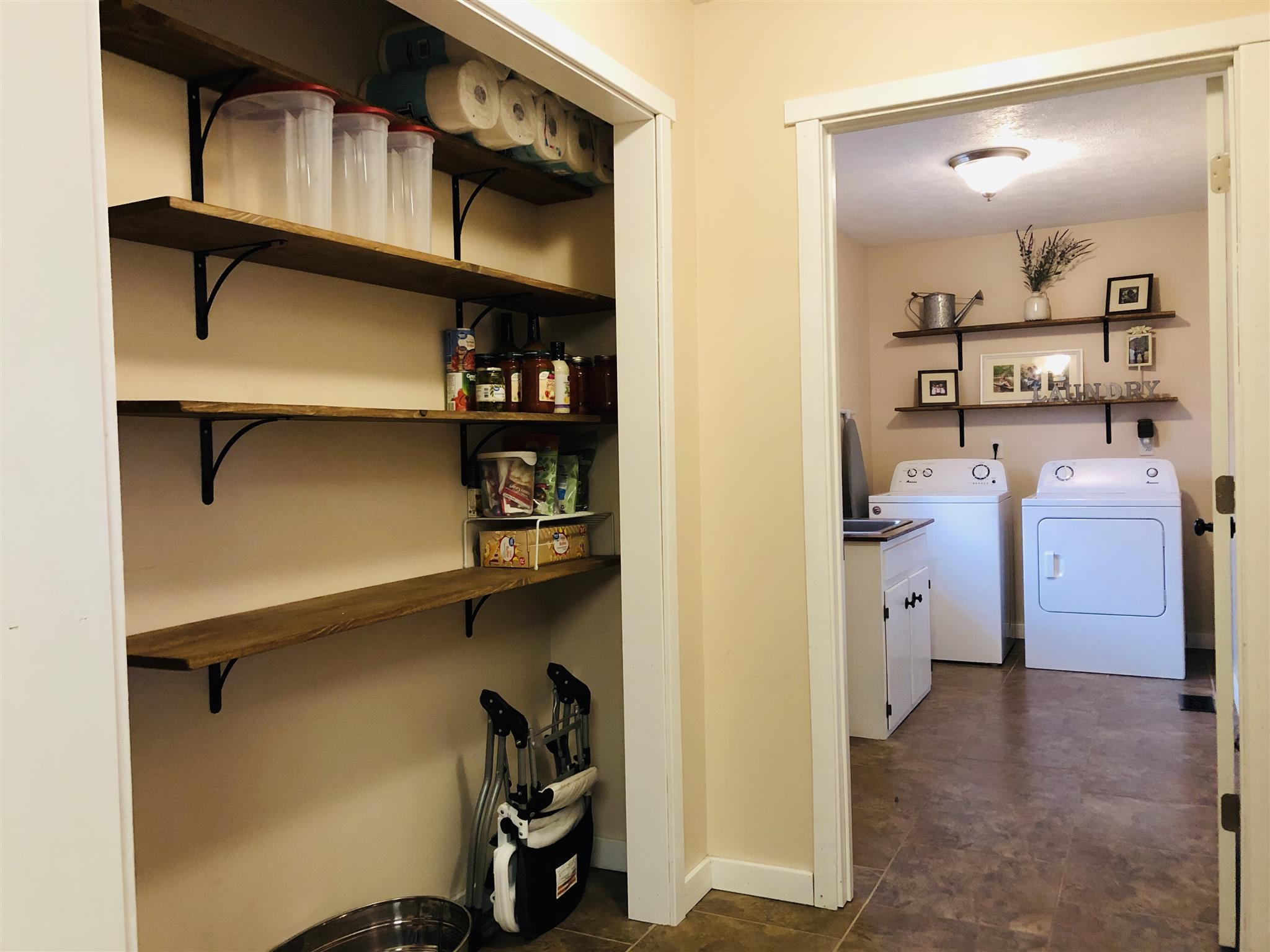 1087 White Bluff Road White Bluff, TN 37187 - Photo 15 of 30 Pantry and view of laundry room