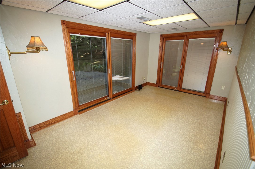 4202 Laubert Road Atwater, OH 44201 - Photo 26 of 31 quality sliding doors from the family room to the outside patio. The sliders have the blinds built into them!!