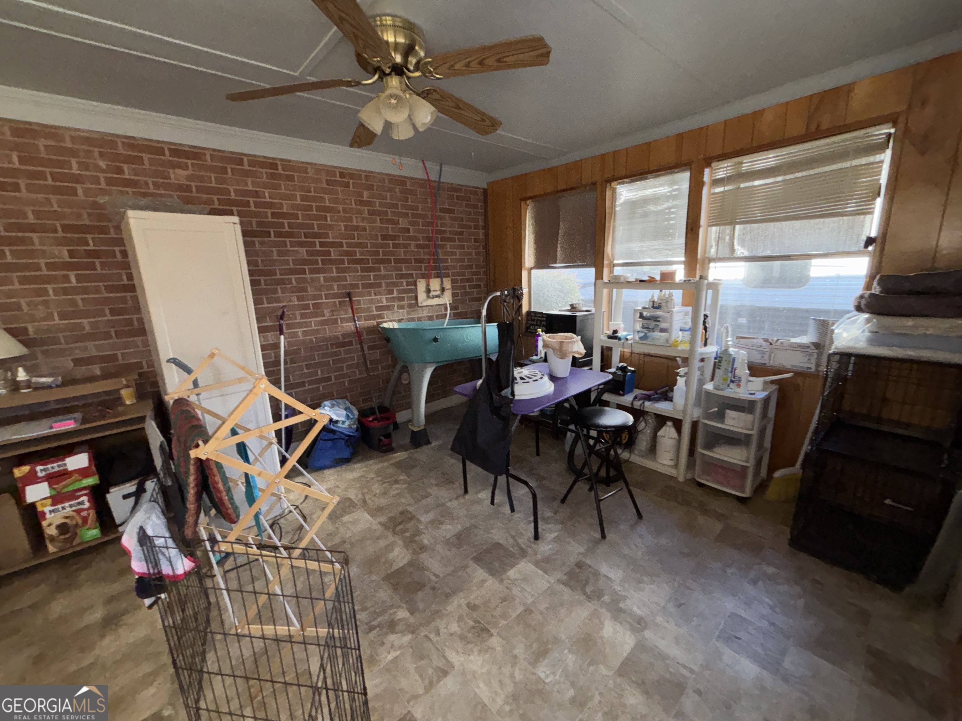 216 East Peter Street Cochran, GA 31014 - Photo 34 of 44 a living room with patio furniture