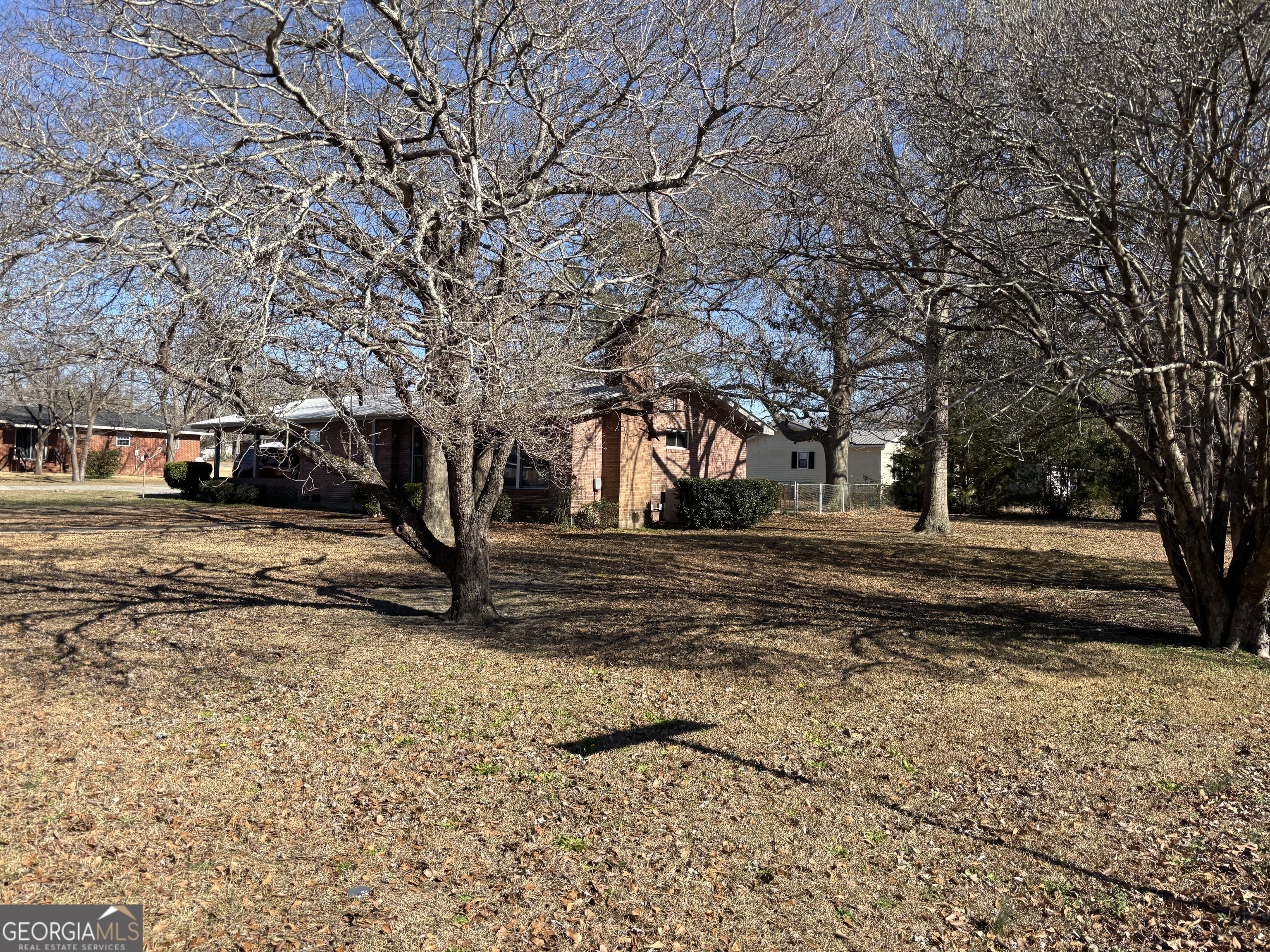 216 East Peter Street Cochran, GA 31014 - Photo 43 of 44 a view of road with trees