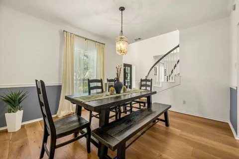 a view of a livingroom with furniture and window