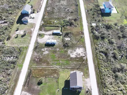 a view of swimming pool with a yard