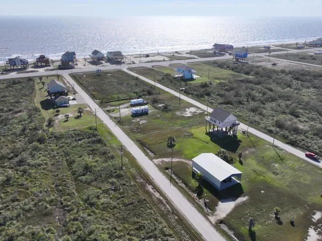 a view of a balcony with chairs