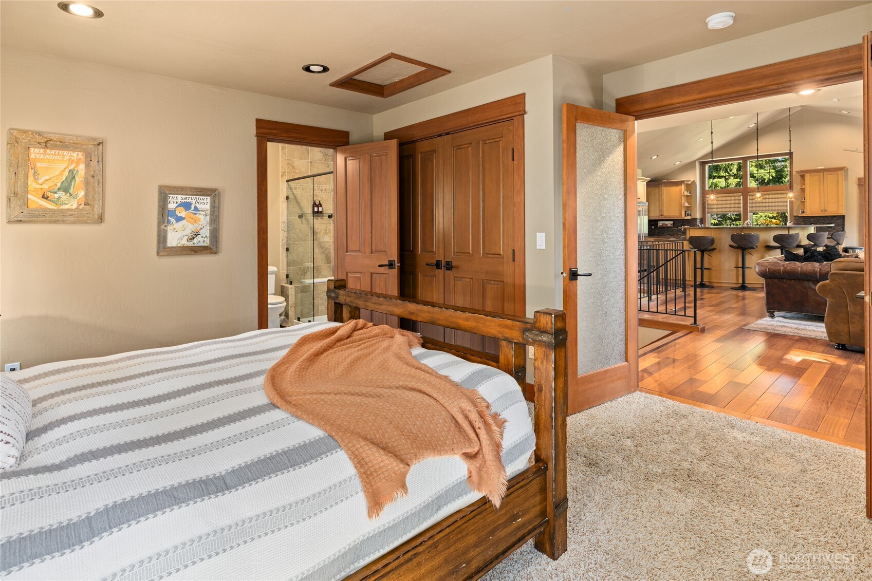 110 Larkspur Loop Cle Elum, WA 98922 - Photo 18 of 40 a bedroom with a bed and glass windows