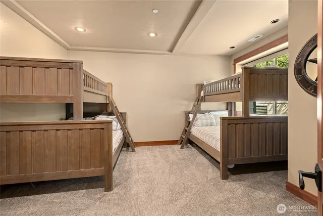 a bedroom with furniture and a window