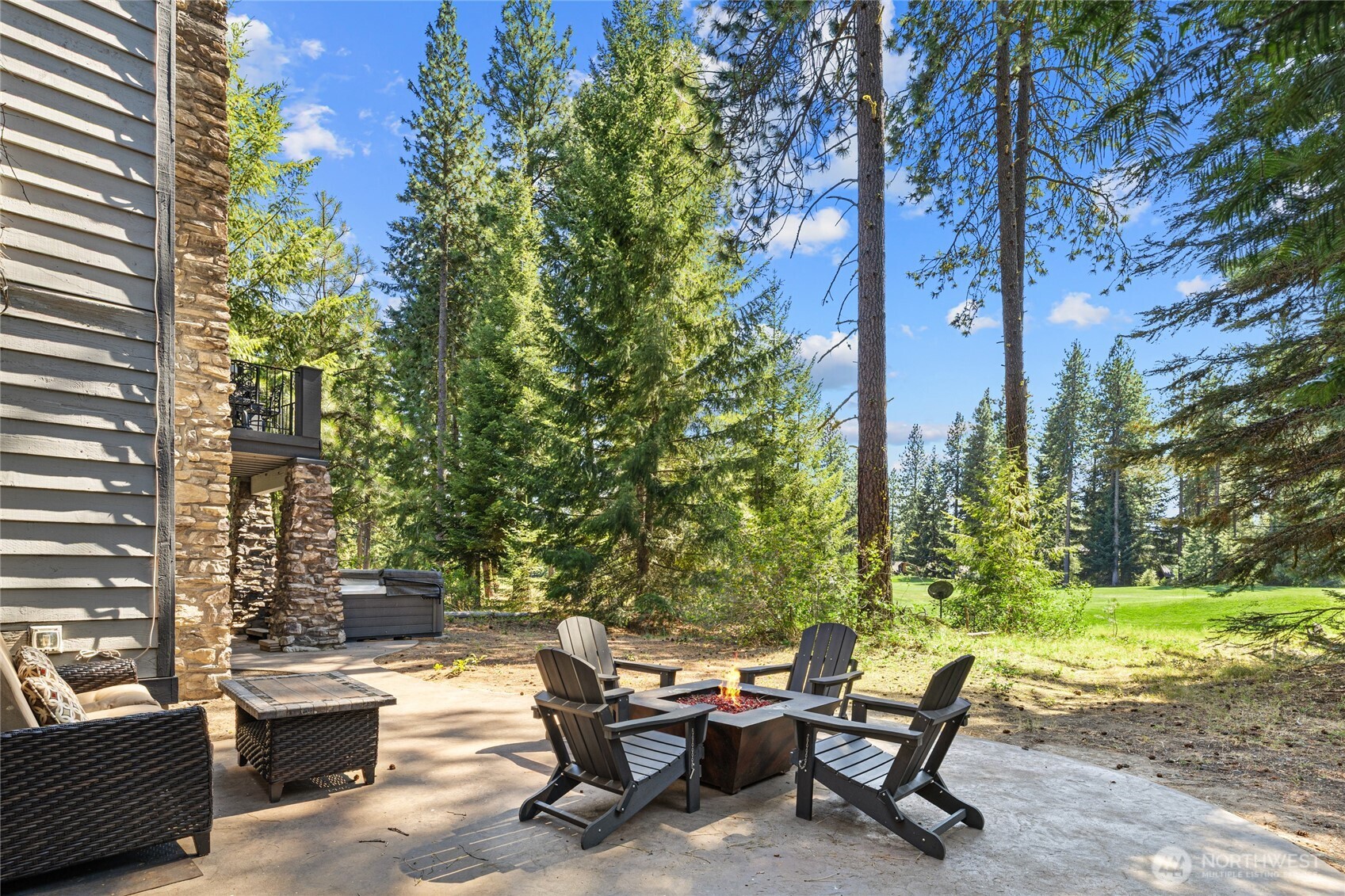 110 Larkspur Loop Cle Elum, WA 98922 - Photo 35 of 40 a backyard of a house with outdoor seating