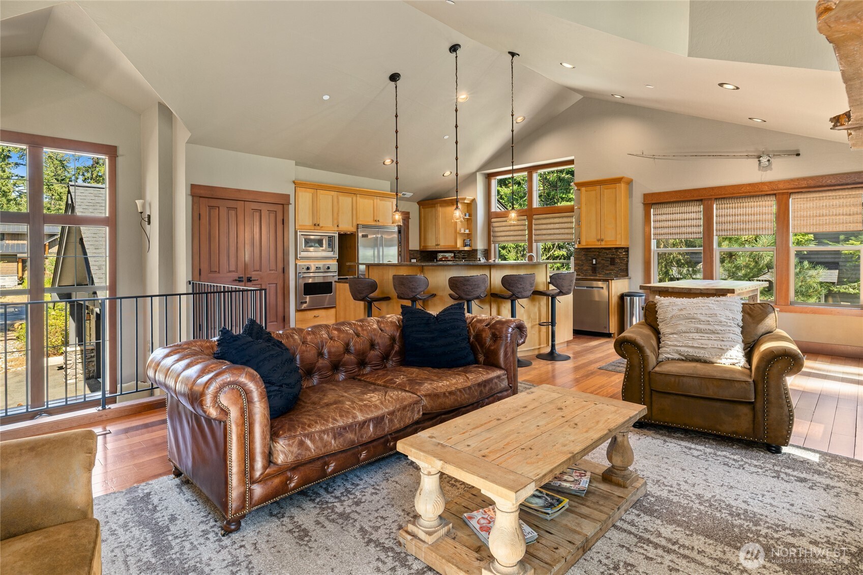 110 Larkspur Loop Cle Elum, WA 98922 - Photo 9 of 40 a living room with furniture ceiling fan and a large window