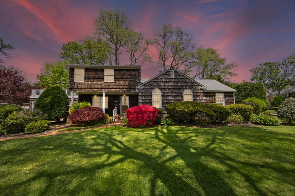 119 Adam Road Massapequa, NY 11758 - Photo 1 of 1 View of front of home featuring a front yard