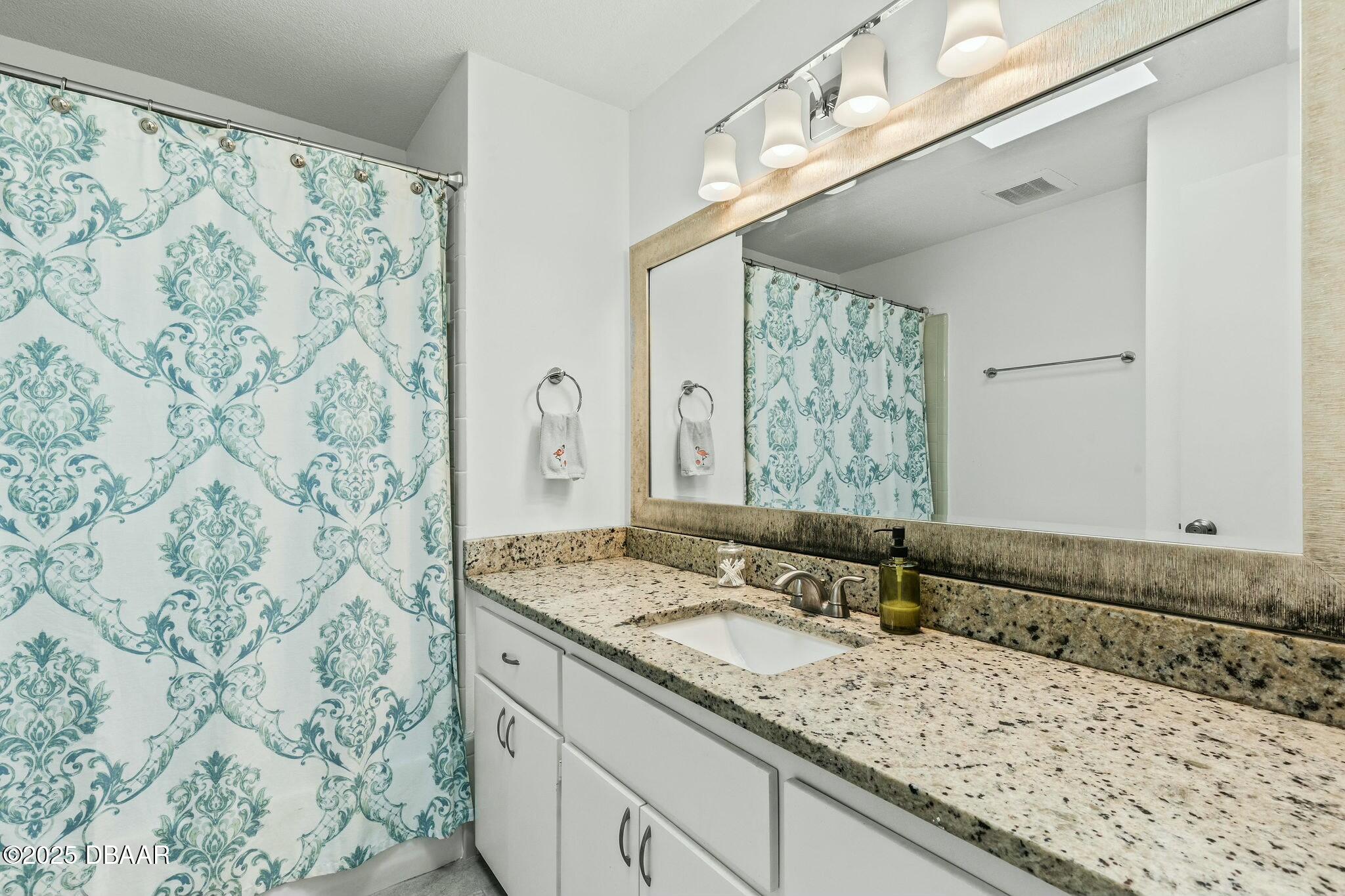 860 Lindenwood Circle Ormond Beach, FL 32174 - Photo 19 of 44 guest bath with tub