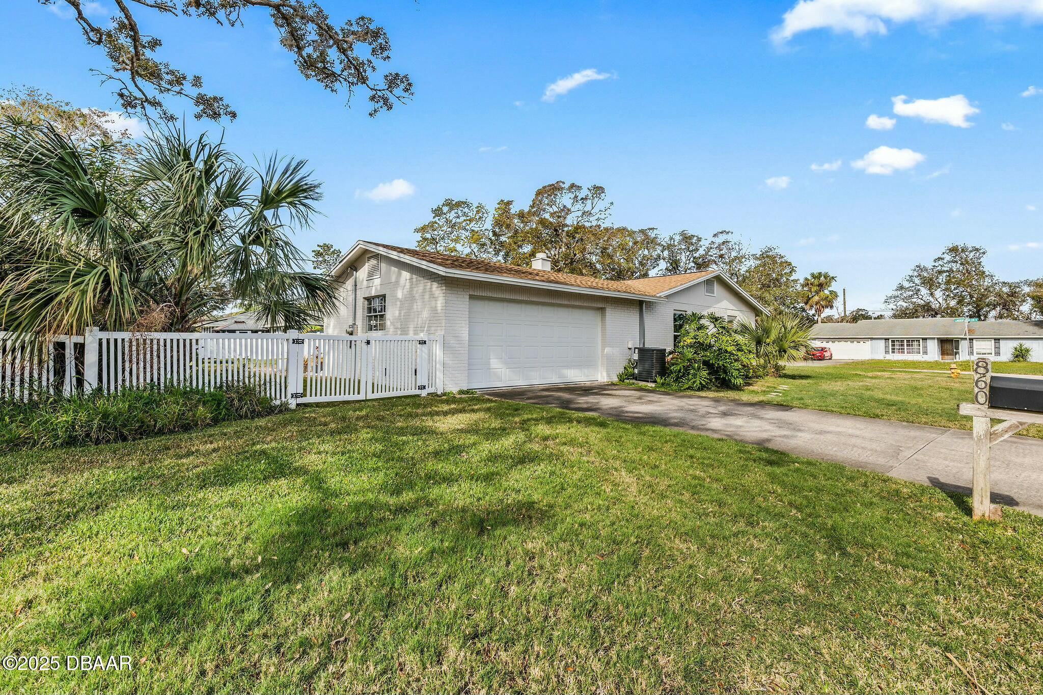 860 Lindenwood Circle Ormond Beach, FL 32174 - Photo 38 of 44 2 car garage