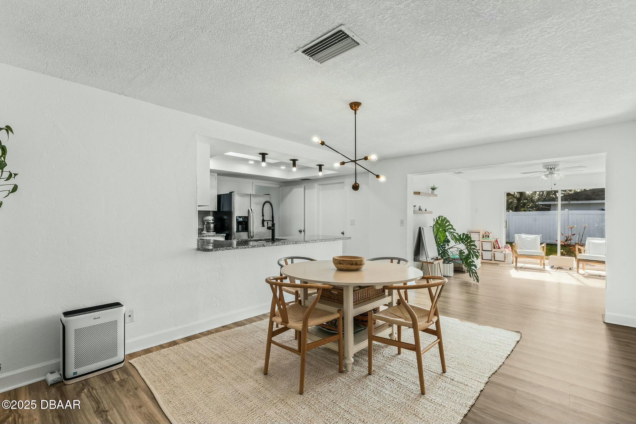 860 Lindenwood Circle Ormond Beach, FL 32174 - Photo 8 of 44 family room/dining