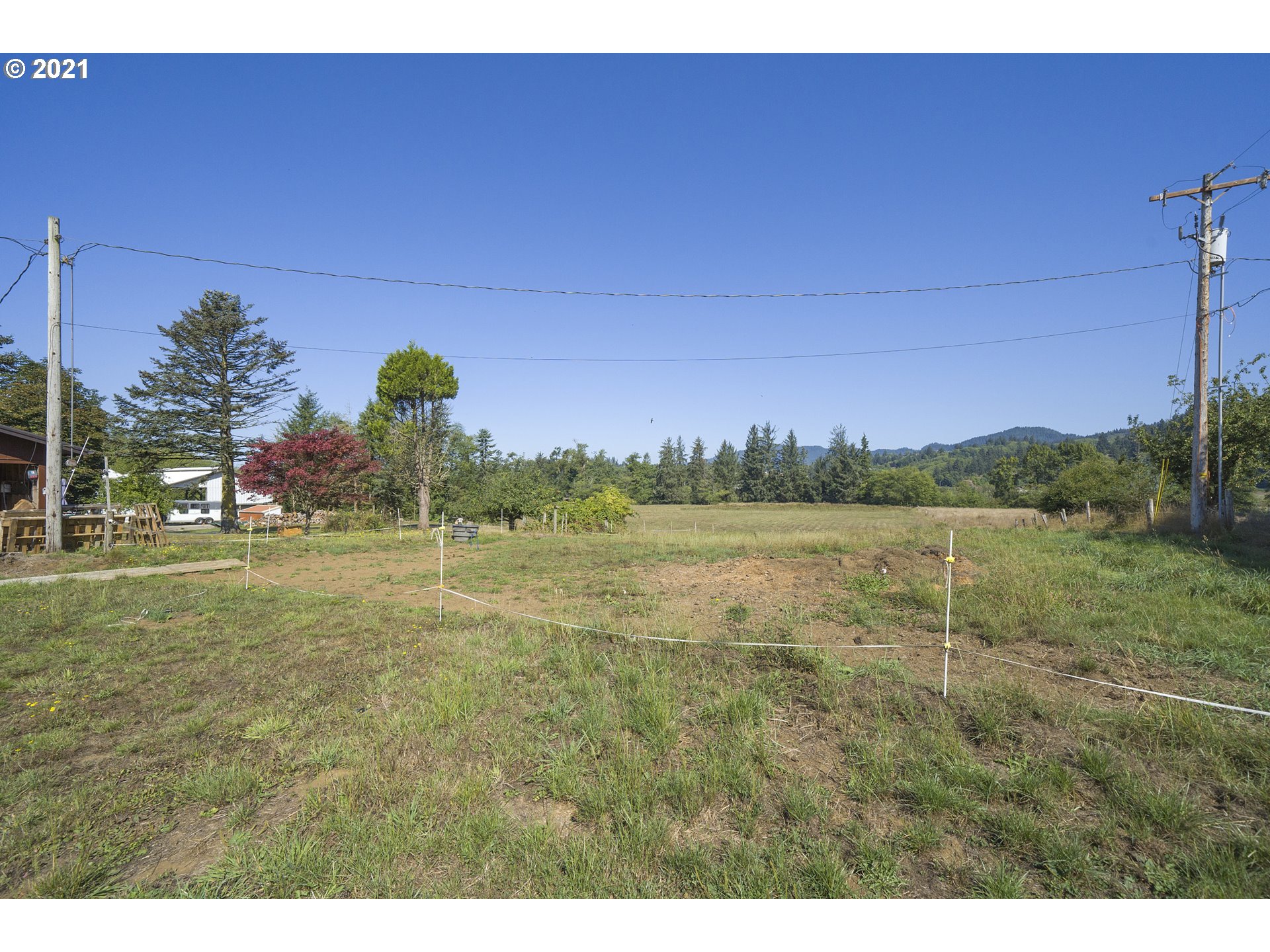 10050 Chance Road Tillamook, OR 97141 - Photo 20 of 31 a view of a lake with a yard