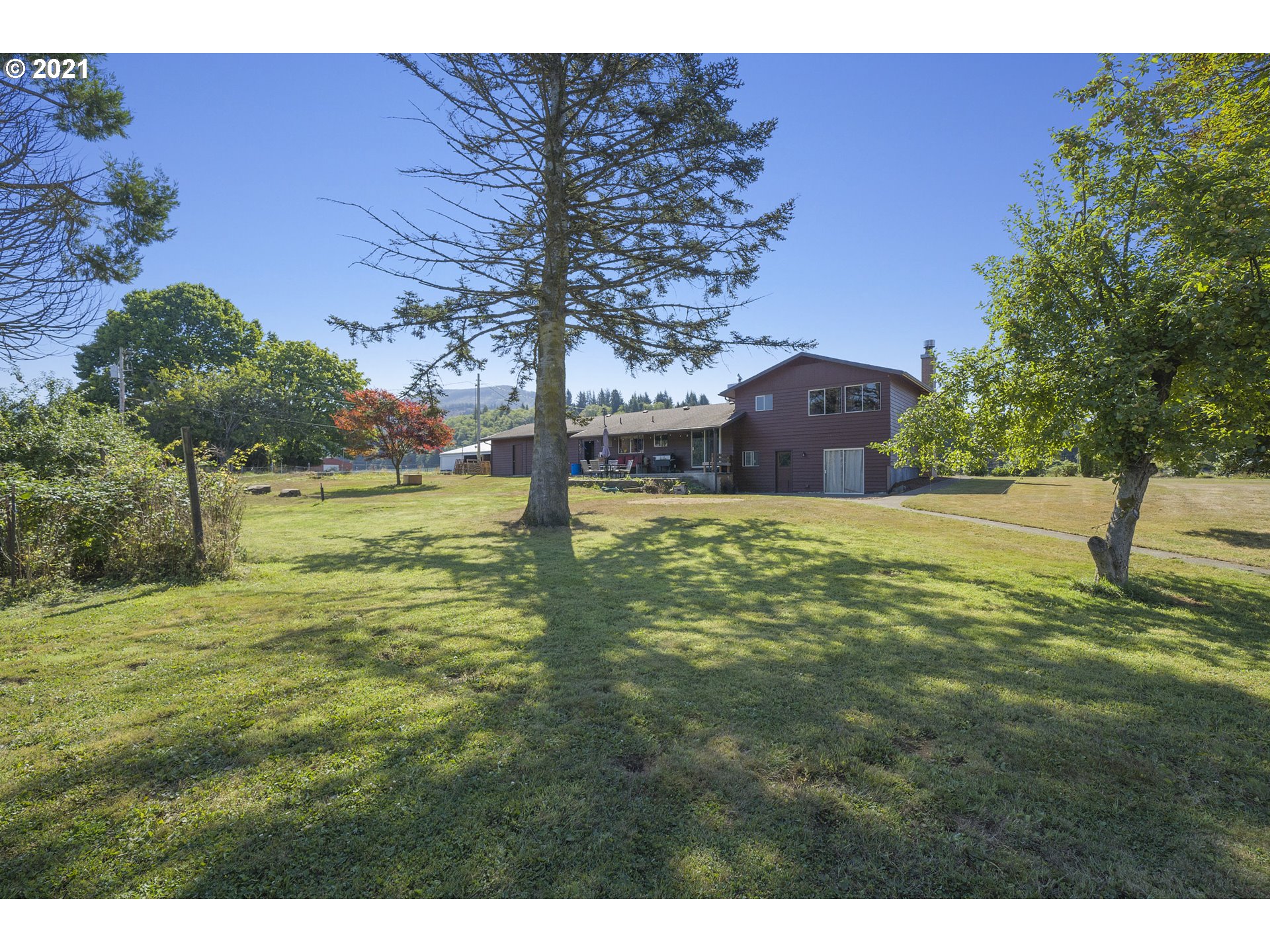 10050 Chance Road Tillamook, OR 97141 - Photo 3 of 31 a big yard with lots of green space